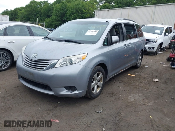 2015 Toyota Sienna LE AAS with VIN 5TDKK3DC0FS588089, listed as a IAAI auction lot 42501791 with 190,322 mi miles and . Bid and sale history available at DreamBid. Image 4.