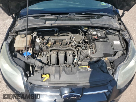 2014 Ford Focus Titanium with VIN 1FADP3N27EL251229, listed as a Copart auction lot 62201195 with 75,534 mi miles and Salvage title. Bid and sale history available at DreamBid. Image 11.