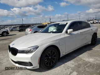 2018 BMW 7 Series 740e xDrive iPerformance with VIN WBA7J2C51JG938111, listed as a Copart auction lot 73361933 with 104,641 mi miles. Bid and sale history available at carsss.com. Image 1.
