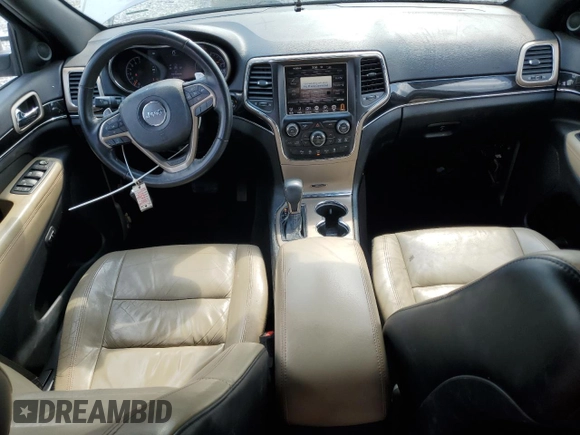 2016 Jeep Grand Cherokee Limited 75th Anniversary with VIN 1C4RJEBG5GC369618, listed as a Copart auction lot 60269055 with 83,494 mi miles and Salvage title. Bid and sale history available at DreamBid. Image 8.