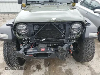 2021 Jeep Wrangler Unlimited Willys with VIN 1C4HJXDG2MW563201, listed as a Copart auction lot 50156305 with 33,372 mi miles and Salvage title. Bid and sale history available at DreamBid. Image 12.