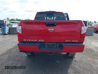 2023 Nissan Titan Pro-4X with VIN 1N6AA1FB9PN104089, listed as a IAAI auction lot 42202488 with 58,151 mi miles and . Bid and sale history available at DreamBid. Image 16.