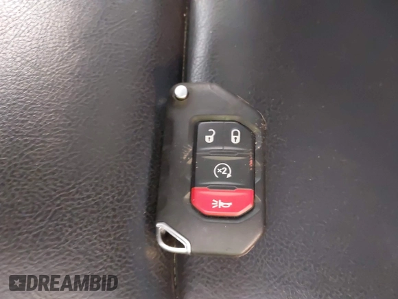 2022 Jeep Wrangler Unlimited Rubicon with VIN 1C4JJXFM0NW154202, listed as a IAAI auction lot 42400067 with 60,486 mi miles and . Bid and sale history available at DreamBid. Image 11.