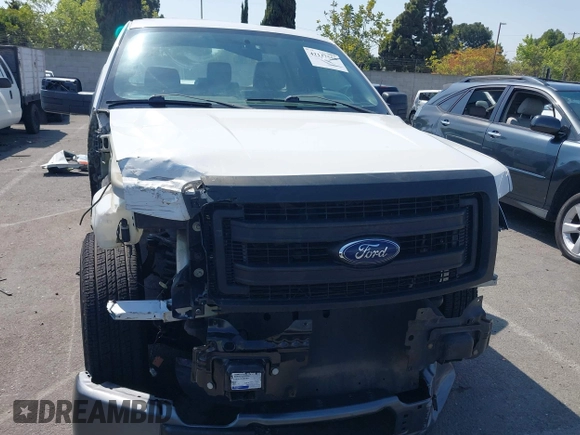 2014 Ford F-150 XL with VIN 1FTMF1CM9EKD53806, listed as a IAAI auction lot 42137550 with 138,888 mi miles and . Bid and sale history available at carsss.com. Image 13.