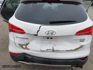 2013 Hyundai Santa Fe 2.0T Sport with VIN 5XYZUDLA9DG067638, listed as a IAAI auction lot 41781769 with 99,022 mi miles. Bid and sale history available at carsss.com. Image 6.