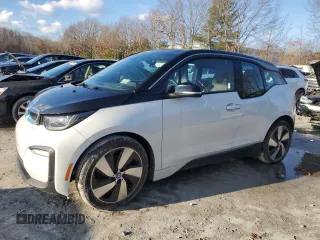 2019 BMW i3 with VIN WBY8P4C53K7E05682, listed as a Copart auction lot 84274824 with 54,497 mi miles and Salvage Title. Bid and sale history available at carsss.com. Image 1.