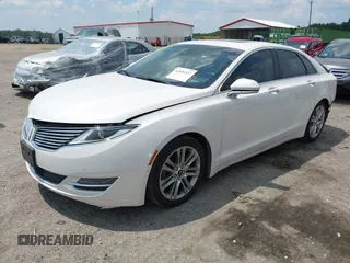 2014 Lincoln MKZ Hybrid z VIN 3LN6L2LU2ER825732, wystawiony jako IAAI lot #42606357 z przebiegiem 153 966 mil mil oraz . Historia ofert i sprzedaży dostępna na DreamBid. Obrazek 2.