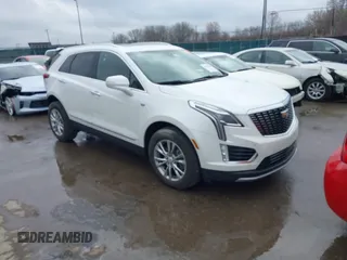2023 Cadillac XT5 AWD Premium Luxury with VIN 1GYKNDR43PZ102819, listed as a IAAI auction lot 42007060 with 16,606 mi miles and . Bid and sale history available at DreamBid. Image 1.