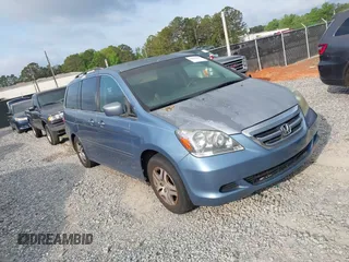 2007 Honda Odyssey EX with VIN 5FNRL38457B037239, listed as a IAAI auction lot 42034219 with 291,885 mi miles. Bid and sale history available at carsss.com. Image 1.