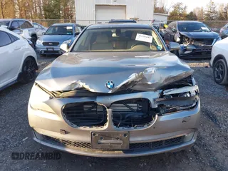 2011 BMW 7 Series 750i xDrive with VIN WBAKC6C58BC394310, listed as a IAAI auction lot 41226102 with 183,907 mi miles and . Bid and sale history available at DreamBid. Image 12.