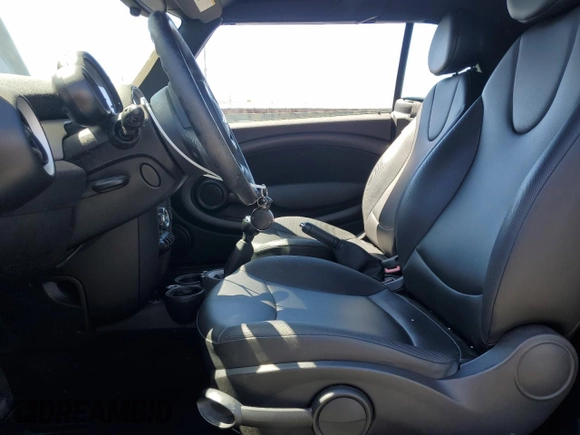 2015 MINI Convertible with VIN WMWZN3C56FT266838, listed as a Copart auction lot 50250745 with 60,331 mi miles and Salvage title. Bid and sale history available at DreamBid. Image 7.