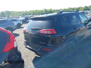 2016 Jeep Cherokee Trailhawk z VIN 1C4PJMBS6GW162742, wystawiony jako IAAI lot #42383200 z przebiegiem 124 791 mil mil oraz . Historia ofert i sprzedaży dostępna na DreamBid. Obrazek 16.