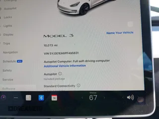 2023 Tesla Model 3 with VIN 5YJ3E1EA6PF495631, listed as a IAAI auction lot 41568118 with 10,073 mi miles and . Bid and sale history available at DreamBid. Image 7.