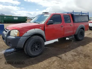 2002 Nissan Frontier XE z VIN 1N6ED29Y12C388949, wystawiony jako Copart lot #55235875 z przebiegiem 212 944 mil mil oraz Szkody całkowita. Historia ofert i sprzedaży dostępna na DreamBid. Obrazek 1.