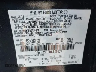 2013 Ford Taurus SHO с VIN 1FAHP2KT8DG159577, выставлен на аукционе IAAI как лот 41107630 с пробегом 90 865 миль миль и . История ставок и продаж доступна на DreamBid. Изображение 9.