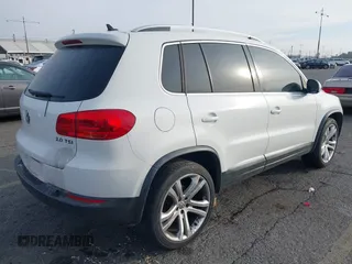 2012 Volkswagen Tiguan SE z VIN WVGAV7AX6CW535969, wystawiony jako IAAI lot #41464523 z przebiegiem 138 858 mil mil oraz . Historia ofert i sprzedaży dostępna na DreamBid. Obrazek 4.