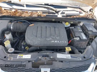 2013 Dodge Grand Caravan SXT with VIN 2C4RDGCGXDR635008, listed as a IAAI auction lot 41859146 with 133,119 mi miles and . Bid and sale history available at DreamBid. Image 10.