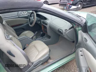 1999 Chrysler Sebring JXi z VIN 3C3EL55H4XT578631, wystawiony jako IAAI lot #42361589 z przebiegiem 120 358 mil mil oraz . Historia ofert i sprzedaży dostępna na DreamBid. Obrazek 5.