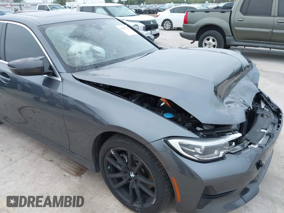 2021 BMW 3 Series 330i with VIN 3MW5R1J09M8C15403, listed as a IAAI auction lot 41892341 with 30,975 mi miles and . Bid and sale history available at carsss.com. Image 17.