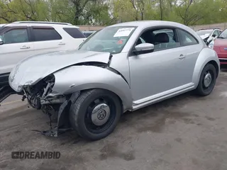 2013 Volkswagen Beetle with VIN 3VWHX7ATXDM658134, listed as a IAAI auction lot 42097779 with 47,901 mi miles and . Bid and sale history available at DreamBid. Image 2.