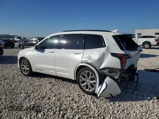2020 Cadillac XT6 AWD Sport z VIN 1GYKPGRS3LZ103327, wystawiony jako Copart lot #85308464 z przebiegiem 106 061 mil mil oraz Szkody całkowita. Historia ofert i sprzedaży dostępna na DreamBid. Obrazek 2.