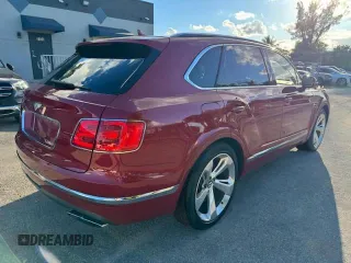 2017 Bentley Bentayga W12 z VIN SJAAC2ZV1HC014037, wystawiony jako Copart lot #54799655 z przebiegiem 36 099 mil mil oraz Szkody całkowita. Historia ofert i sprzedaży dostępna na DreamBid. Obrazek 3.