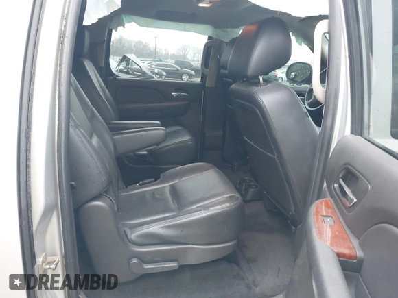 2014 Chevrolet Suburban LTZ with VIN 1GNSCKE05ER173446, listed as a IAAI auction lot 41047096 with 189,049 mi miles and . Bid and sale history available at DreamBid. Image 8.