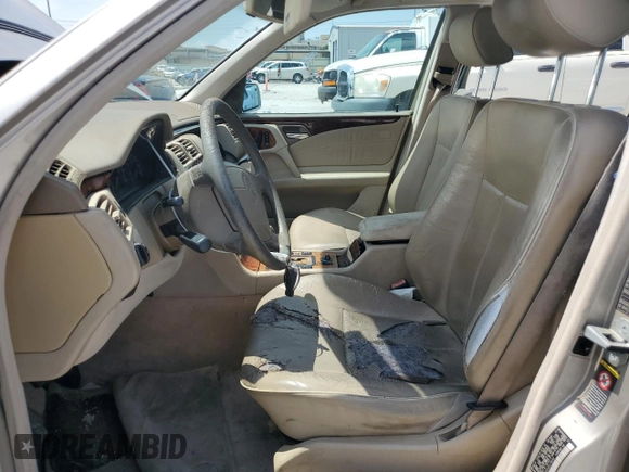 1999 Mercedes-Benz E-Class with VIN WDBJF65H2XA796192, listed as a Copart auction lot 64326604 with 237,141 mi miles and Clean Title. Bid and sale history available at carsss.com. Image 7.