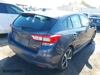 2017 Subaru Impreza Sport with VIN 4S3GTAK61H1731989, listed as a IAAI auction lot 41819366 with 93,369 mi miles. Bid and sale history available at carsss.com. Image 4.