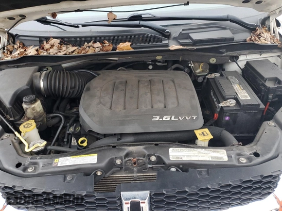 2012 Dodge Grand Caravan SXT with VIN 2C4RDGCG7CR364598, listed as a Copart auction lot 81848314 with 173,022 mi miles and Non Repairable. Bid and sale history available at DreamBid. Image 12.