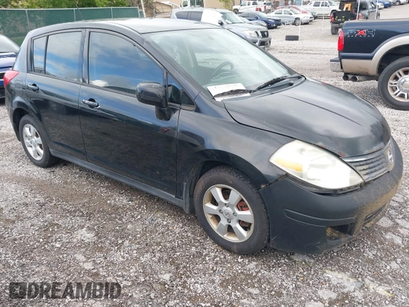 2009 Nissan Versa 1.8 S with VIN 3N1BC13E79L354341, listed as a IAAI auction lot 42079896 with 118,797 mi miles. Bid and sale history available at carsss.com. Image 1.