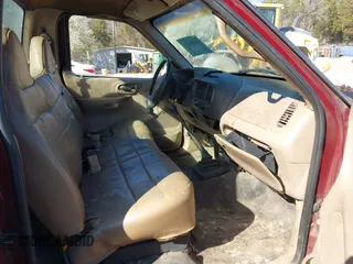 1999 Ford F-150 with VIN 1FTZF1722XKA76885, listed as a IAAI auction lot 41824733 with Not provided miles and . Bid and sale history available at DreamBid. Image 5.