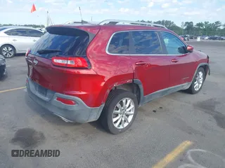 2016 Jeep Cherokee Limited with VIN 1C4PJLDSXGW127497, listed as a IAAI auction lot 42173536 with 240,866 mi miles and . Bid and sale history available at DreamBid. Image 4.