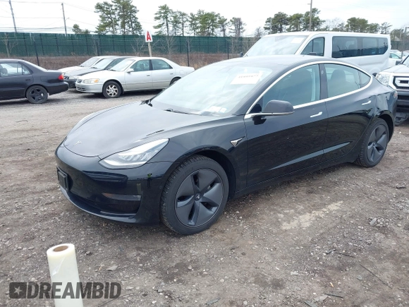 2019 Tesla Model 3 Mid Range with VIN 5YJ3E1EA2KF395549, listed as a IAAI auction lot 41895977 with 97,108 mi miles and . Bid and sale history available at carsss.com. Image 19.