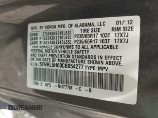 2012 Honda Odyssey EX-L with VIN 5FNRL5H60CB054277, listed as a IAAI auction lot 42459861 with 205,722 mi miles and . Bid and sale history available at DreamBid. Image 9.