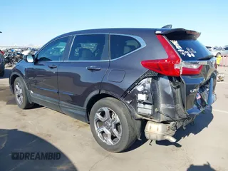 2018 Honda CR-V EX-L z VIN 7FARW1H87JE055784, wystawiony jako IAAI lot #42028869 z przebiegiem 135 222 mil mil oraz . Historia ofert i sprzedaży dostępna na DreamBid. Obrazek 3.