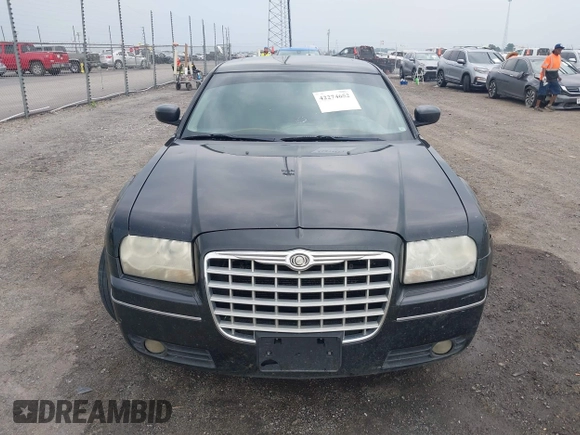 2006 Chrysler 300 Touring z VIN 2C3LA53G36H113174, wystawiony jako IAAI lot #42274652 z przebiegiem 229 422 mil mil oraz . Historia ofert i sprzedaży dostępna na DreamBid. Obrazek 12.