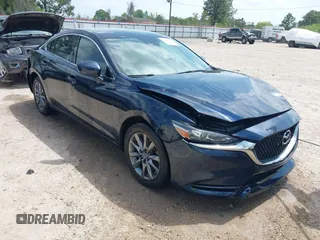 2018 Mazda 6 Sport with VIN JM1GL1UM7J1334658, listed as a IAAI auction lot 41938763 with 129,563 mi miles. Bid and sale history available at carsss.com. Image 1.