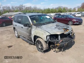 2004 GMC Envoy SLE with VIN 1GKDT13S342125813, listed as a IAAI auction lot 42081178 with 245,015 mi miles and . Bid and sale history available at DreamBid. Image 1.