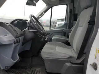 2015 Ford Transit Cargo with VIN 1FTYE1CM7FKA24477, listed as a Copart auction lot 86310214 with 54,098 mi miles and Salvage title. Bid and sale history available at DreamBid. Image 7.