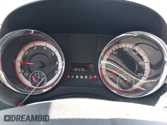 2014 Dodge Grand Caravan SXT with VIN 2C4RDGCG1ER429495, listed as a IAAI auction lot 42058513 with 136,936 mi miles and . Bid and sale history available at DreamBid. Image 7.