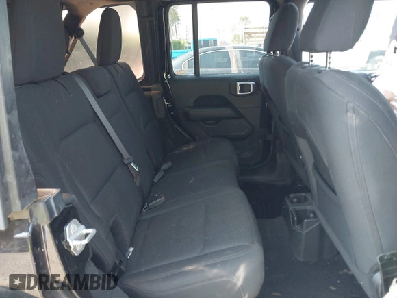 2018 Jeep Wrangler Unlimited Sahara with VIN 1C4HJXEN7JW328981, listed as a IAAI auction lot 42217508 with 59,584 mi miles and . Bid and sale history available at DreamBid. Image 8.
