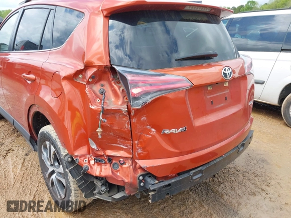2016 Toyota RAV4 LE with VIN JTMZFREV9GJ074360, listed as a IAAI auction lot 42013611 with 87,578 mi miles. Bid and sale history available at carsss.com. Image 6.
