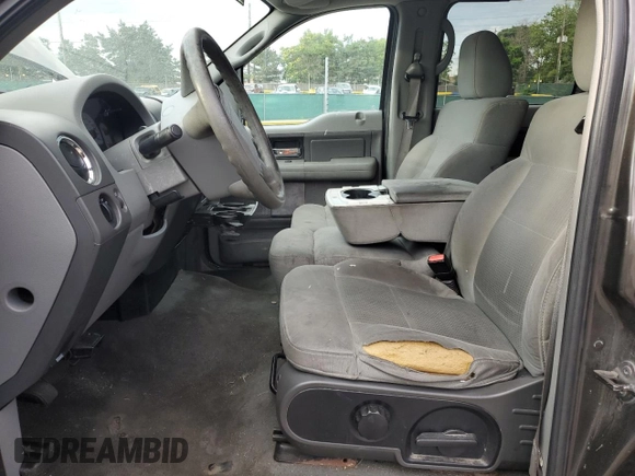 2007 Ford F-150 XLT with VIN 1FTRW14W67KA54542, listed as a Copart auction lot 66049965 with 131,085 mi miles and Clean title. Bid and sale history available at DreamBid. Image 7.