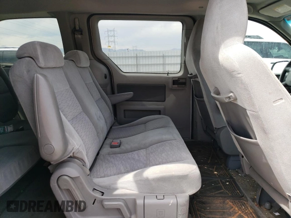 2004 Ford Freestar SE z VIN 2FMDA51644BA32951, wystawiony jako Copart lot #54115905 z przebiegiem 90 629 mil mil oraz Szkoda całkowita • Salvage title. Historia ofert i sprzedaży dostępna na DreamBid. Obrazek 11.