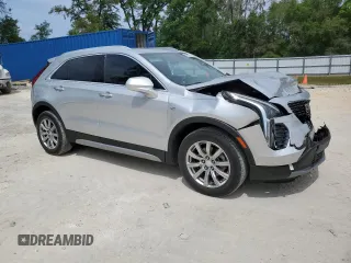 2019 Cadillac XT4 FWD Premium Luxury z VIN 1GYFZCR44KF195554, wystawiony jako Copart lot #55728095 z przebiegiem 35 948 mil mil oraz Nie do naprawy. Historia ofert i sprzedaży dostępna na DreamBid. Obrazek 4.