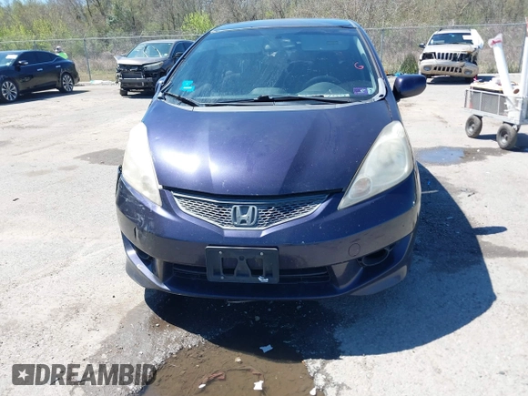 2009 Honda Fit Sport with VIN JHMGE88479S007307, listed as a IAAI auction lot 41801827 with 212,998 mi miles. Bid and sale history available at carsss.com. Image 12.