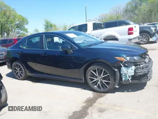 2021 Toyota Camry SE Nightshade with VIN 4T1G11AK3MU462290, listed as a IAAI auction lot 42033207 with 111,163 mi miles and . Bid and sale history available at DreamBid. Image 14.