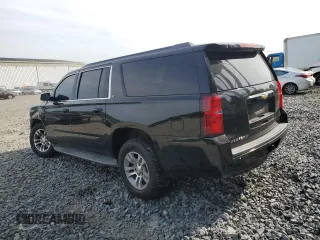 2015 Chevrolet Suburban LT with VIN 1GNSKJKC4FR192292, listed as a Copart auction lot 60434444 with 304,830 mi miles and Salvage Title. Bid and sale history available at DreamBid. Image 2.