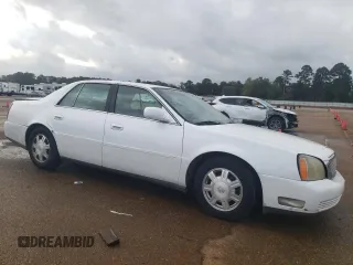 2002 Cadillac DeVille z VIN 1G6KD54Y42U247207, wystawiony jako Copart lot #77691724 z przebiegiem 71 514 mil mil oraz Szkody całkowita. Historia ofert i sprzedaży dostępna na DreamBid. Obrazek 4.